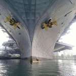 image for The size of the USS Midway compared to a man in his Kayak is astounding