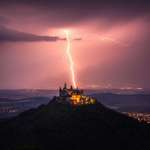 image for I took a picture of a lightning bolt striking behind Hohenzollern Castle in Germany.