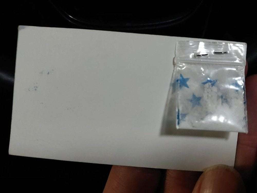 image for Man accused of peddling business cards with 'free samples' of cocaine
