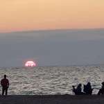 image for Chicago skyline visible from nearly 50 miles away in Indiana Dunes sunset.