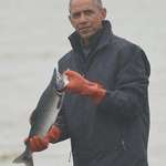 image for President Barack Obama poses with a fish