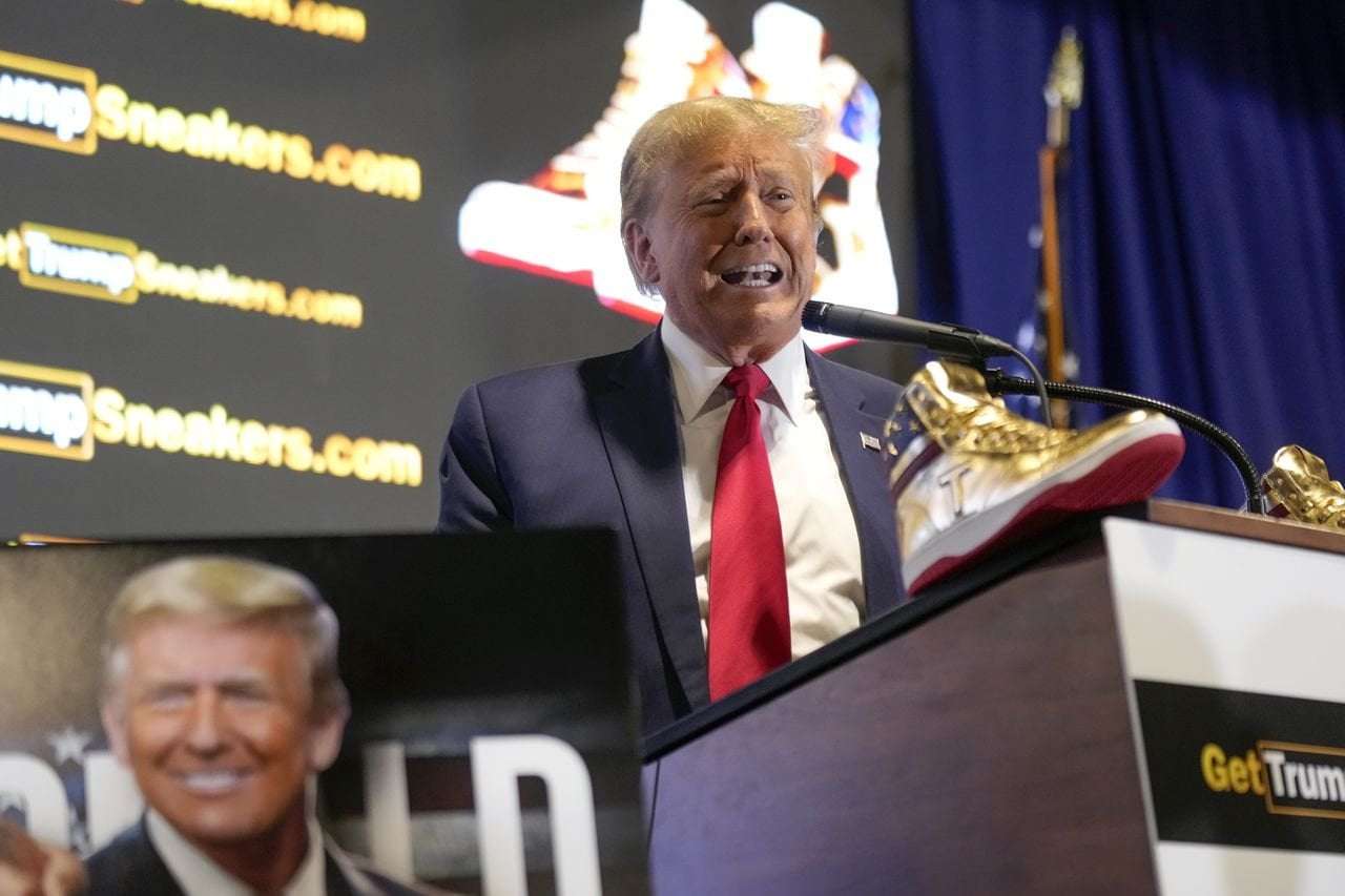 image for Trump booed as he hawks $399 ‘Never Surrender’ shoes at Philadelphia Sneaker Con