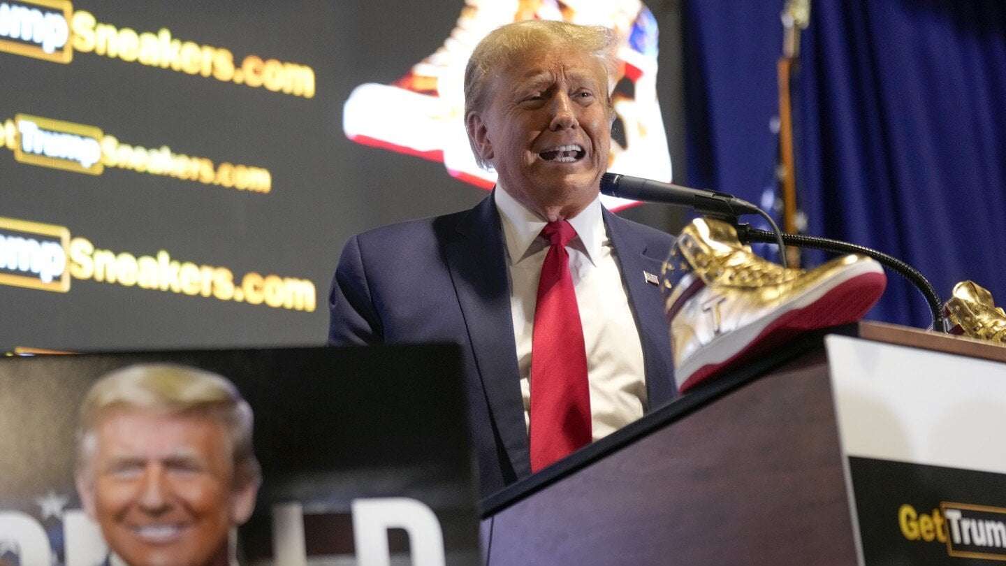 image for Trump hawks $399 branded shoes at ‘Sneaker Con,’ a day after a $355 million ruling against him
