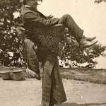 image for A Sikkimese woman carrying a British merchant on her back, India, c. 1900.