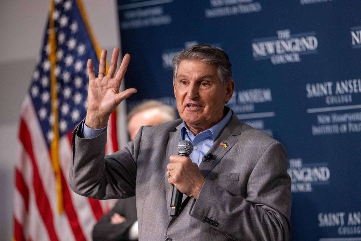 image for Protester thrown to the ground after calling Joe Manchin "a sick f**k" to his face