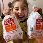 image for Little girl happy her family received chicken for the first time in months.
