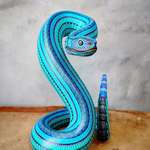 image for Just finished this painted wooden snake sculpture