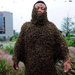 image for She Ping covered his body with about 331,000 bees