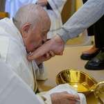 image for Pope Francis washes feet of 12 women at Rome prison from his wheelchair during Holy Thursday.