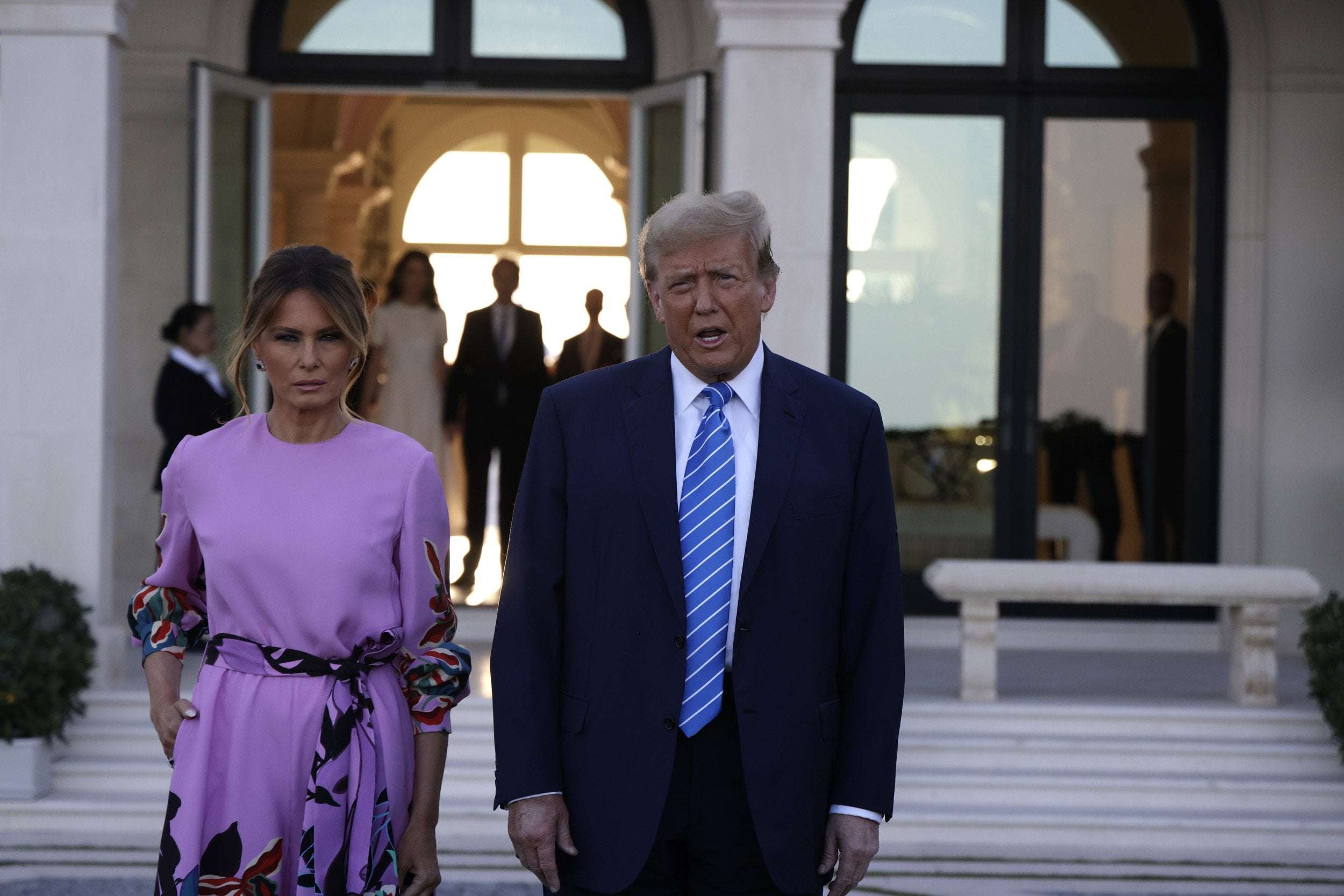 image for Melania's Appearance With Donald Trump Sparks Mockery: 'Checking the Clock'