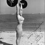 image for Abbye "Pudgy" Stockton lifting 135 lbs overhead at Muscle Beach, California. Circa 1940s.