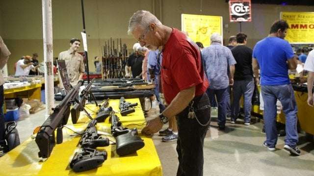 image for New Biden administration rule aims to end gun show 'loophole'