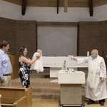 image for Baby getting baptised during Covid