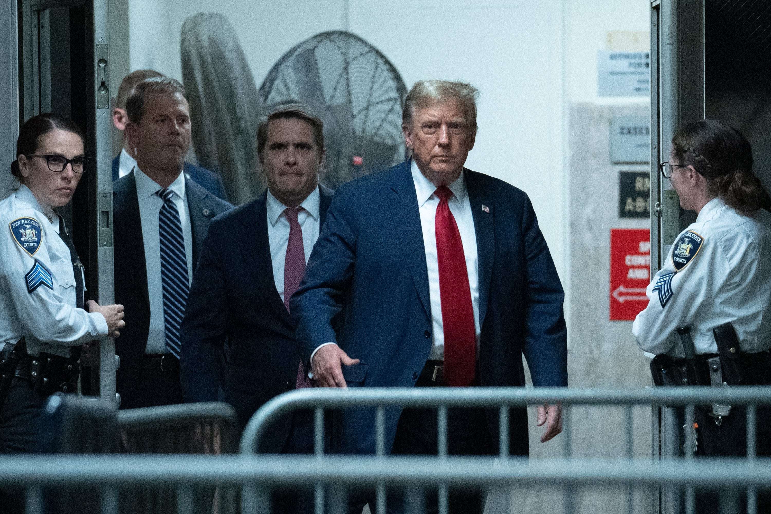 image for Donald Trump 'Glares' at Reporter Who Exposed Him Sleeping During Trial
