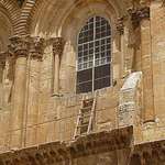 image for Ladder left there by worker on Church of Holy Sepulchre in the 1700s due to a status quo