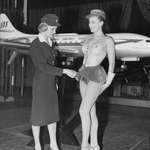 image for A Scandinavian stewardess examines a new uniform idea for its airline, 1964. It wasn't approved.