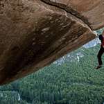 image for Alex Honnold climbing a mountain without ropes.