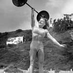 image for Abby Stockton Playing with a weight in California Beach 1940s.