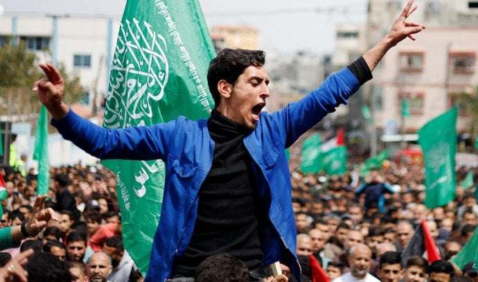 image for Asylum seeker convicted of wearing Hamas headband in London