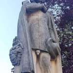 image for A wasp nest on a statue of Karel Havlíček Borovský in Prague.