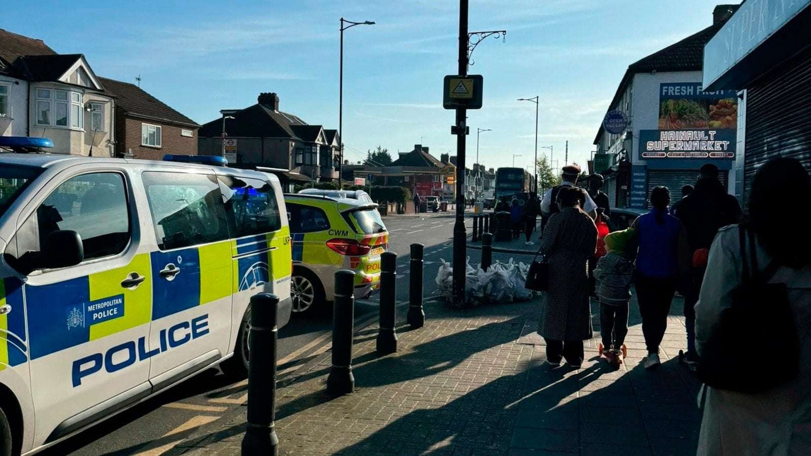 image for Boy, 14, dies after man with sword stabs multiple people near London tube station