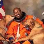 image for Astronaut poses with his “family” before a shuttle mission.