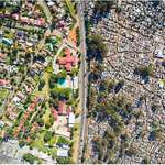 image for A picture of a rich suburb next to poor shanty town in Johannesburg, South Africa