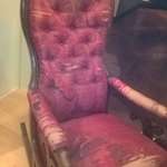 image for The chair Abraham Lincoln was assassinated in. Henry Ford museum