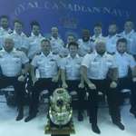 image for The Canadian Naval Diving Academy celebrates graduation with an underwater class photo.