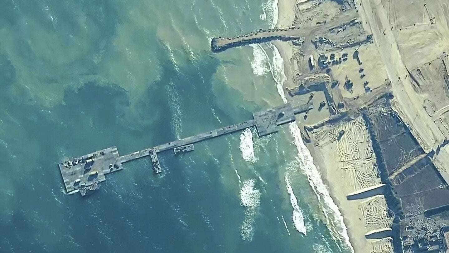 image for Trucks are rolling across a new US pier into Gaza. But challenges remain to getting enough aid in