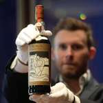image for A bottle of whisky from 1926 reached a record-breaking price in an auction. $2.65 million