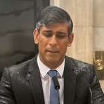 image for UK Prime Minister Rishi Sunak announcing a general election in heavy rain
