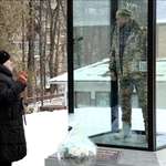 image for The mother of Oleksandr Matsievskyi, a Ukrainian Soldier executed by russians, visiting his memorial
