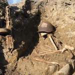 image for WWII Russian soldier found 75 years after the war, buried inside a trench.