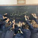 image for Iranian highschool girls defying the regime by not wearing hijab and showing middle fingers