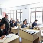 image for Kim Jong Un looking over students during a lecture at a newly completed cadre school