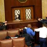 image for U.S. capitol security defending the main hall from Trump voters during the Jan 6th insurrection.