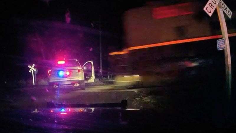 image for Colorado officials reach $8.5 million settlement with woman who was left handcuffed in a police car that was hit by a train
