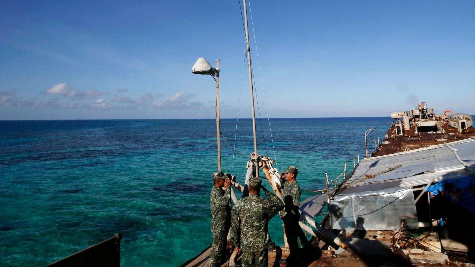 image for Philippines says China coast guard seized food dropped by plane for Filipino forces