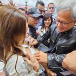 image for NVIDIA President/CEO Jensen Huang signing a shirt at COMPUTEX conference