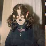 image for Me, age 7, dressed up as our dog for Halloween