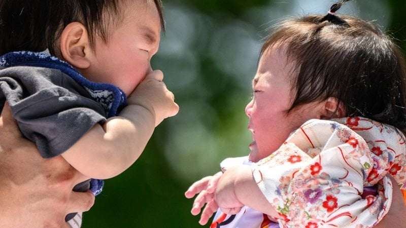 image for Japan’s births just fell to a new record low. Tokyo hopes a dating app can turn that around