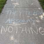 image for Spotted this chalk graffiti yesterday close to a local school and found it "absoluty" hilarious!