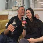 image for A father embracing his daughter who was rescued from Captivity after 250 days