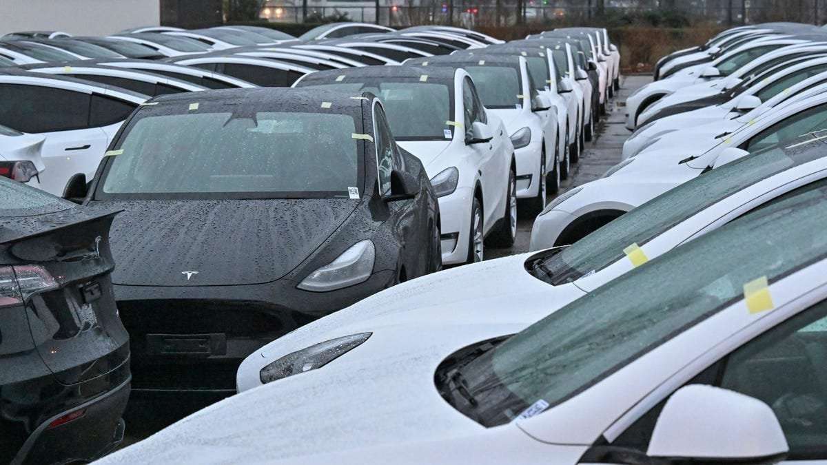 image for So Many Unsold Teslas Are Piling Up That You Can See Them From Space