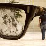 image for A statue of the broken glasses of Salvador Allende In the lobby of a Venezuelan ministry
