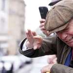 image for Farage gets more stuff thrown at him, this time while on top of a bus.