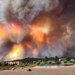 image for Smoke from the South Fork fire burning just outside of Ruidoso, New Mexico. Over 8,000 evacuated.