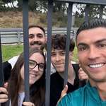 image for Cristiano Ronaldo walks through the bushes in Germany to take a selfie with his fans