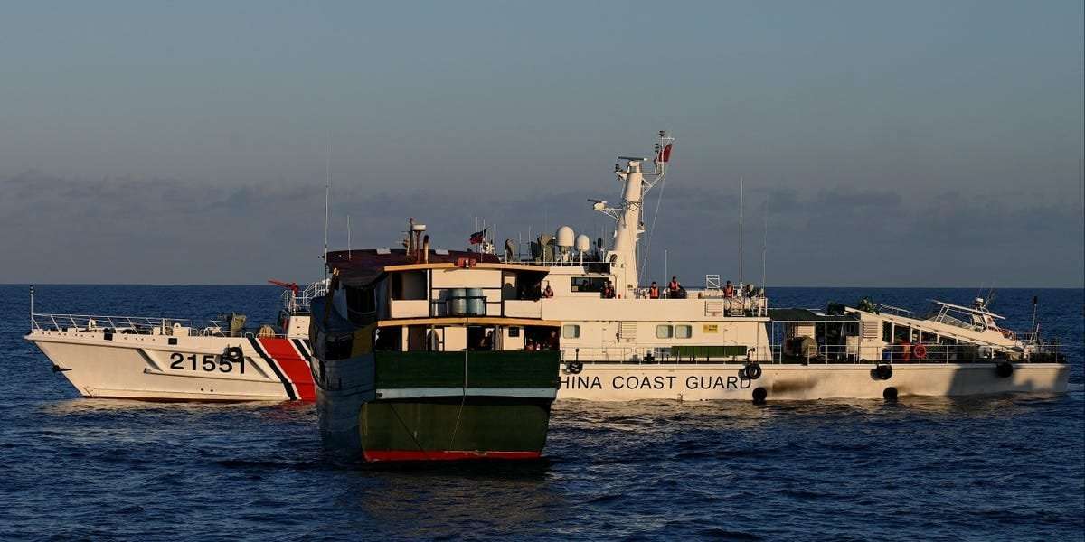 image for Filipino soldiers had to use their bare hands to fight off Chinese coast guards with swords, a general said